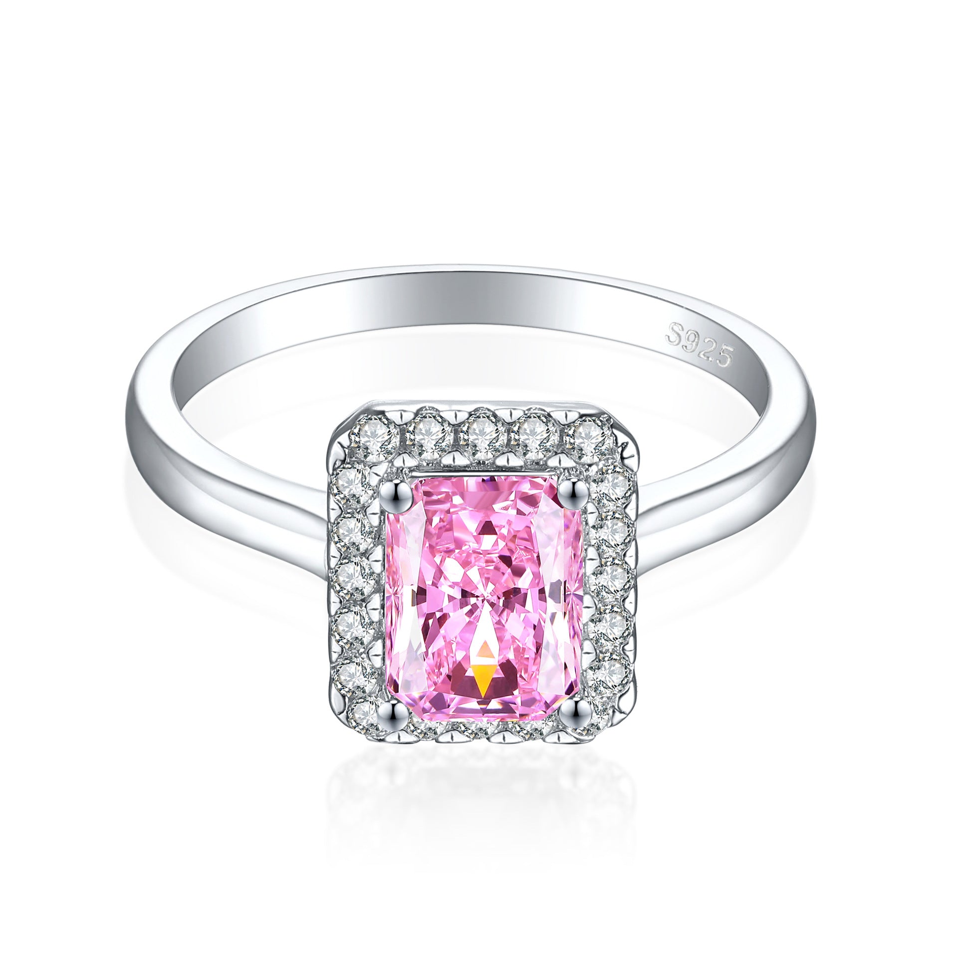 Emerald cut pink stone halo ring in sterling silver with a plain polished band on white