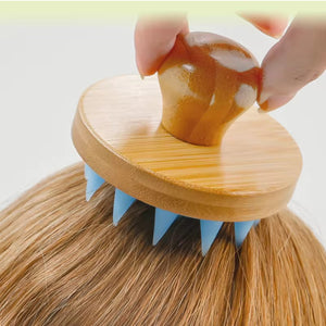 Bamboo backed silicone scalp massage brush with soft tapered cones for washing hair and easing the scalp