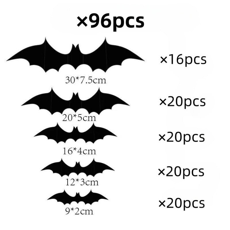 Layered black bat wall stickers casting shadows on a white wall