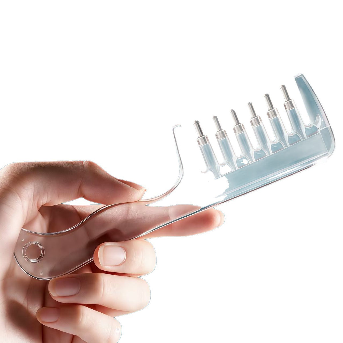 Close view of the hollow dispensing teeth and rounded tips on the clear scalp massage comb