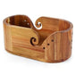Acacia yarn bowl without the lid, scroll cuts on both walls and round holes on the sides