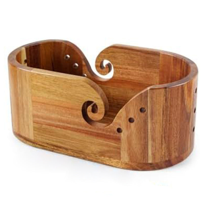 Acacia yarn bowl without the lid, scroll cuts on both walls and round holes on the sides