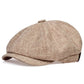 Vintage newsboy flat cap with an adjustable back tab and short stitched brim