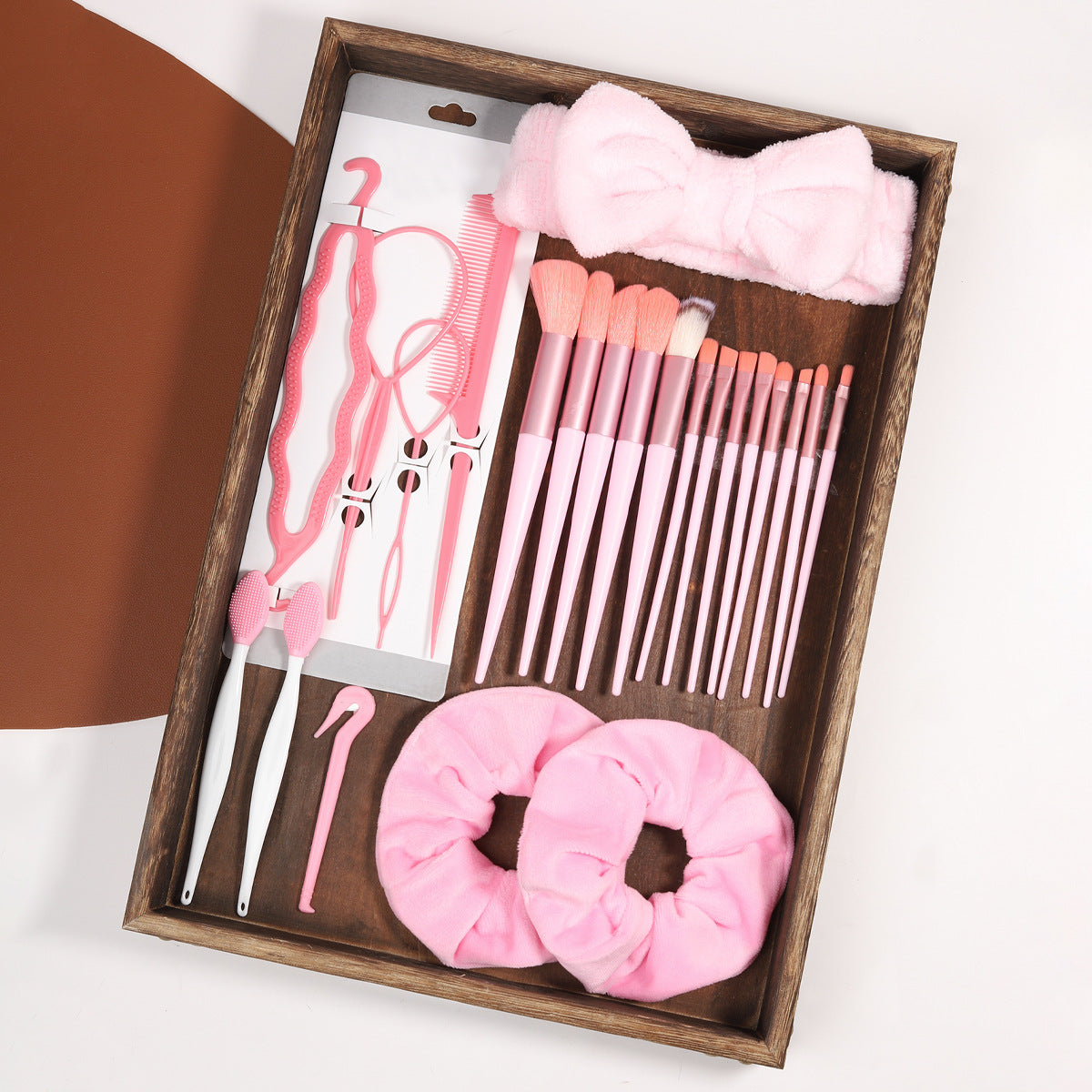 Full boxed set with foam sponges, velvet puffs, a spa headband and a facial cleansing brush