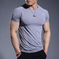 Detail of the crew neck and stitched hem on the fitness t-shirt