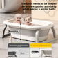 Two babies sitting in a cream and gray foldable baby bathtub with a 27 cm basin depth comparison