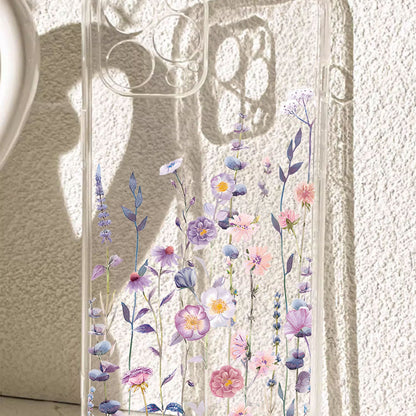 Clear TPU phone case with a purple wildflower print shown on a phone