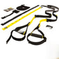 TRX suspension trainer foam grip handles foot cradles and adjustable webbing straps laid flat