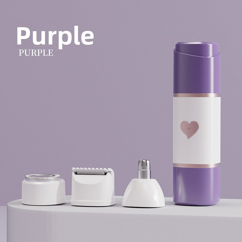 Purple mini shaver body on a podium beside its foil, blade and nose heads