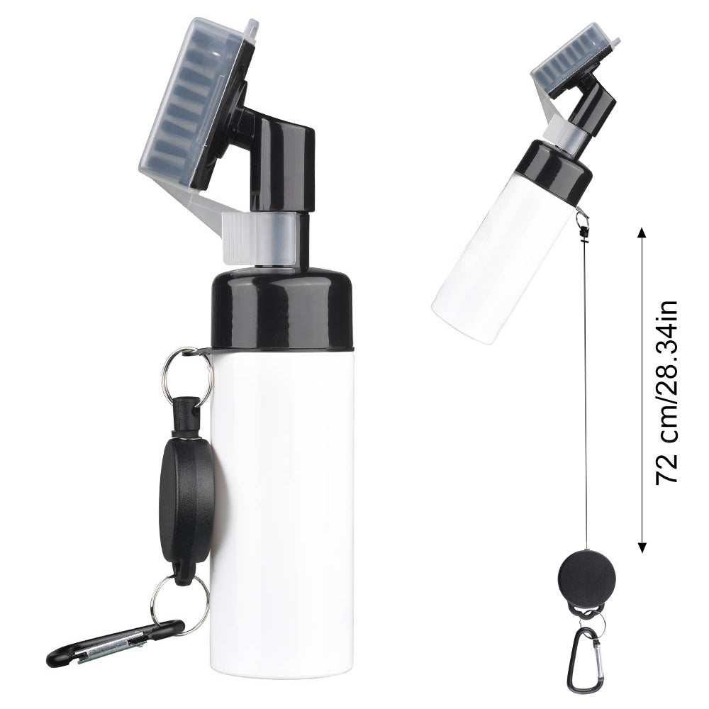 Golf cleaner bottle with a cord lock buckle beside the stiff brush head
