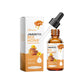 White XImonth carton and amber glass 30 ml bottle with black cap and glass pipette on a plain background