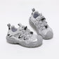 Kids Anti-Slip Running Shoes | scale reference with hand