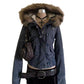 Navy blue jacket with a fur trimmed hood, button front, zip and a small animal logo on the chest on a mannequin