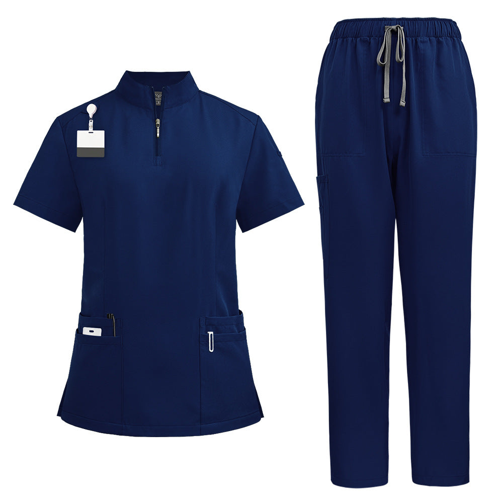 Scrub top worn with the collar zip fully closed at the neck