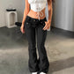 Womens solid black retro flare jeans front view with low rise waist and a moderate flare