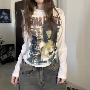Y2K anime graphic long sleeve tee shown on a model with low rise denim