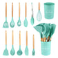 Mint green kitchen utensil set shown in rows next to the filled storage holder