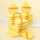 Velvet triangle powder puffs and round puffs beside teardrop foam makeup sponges
