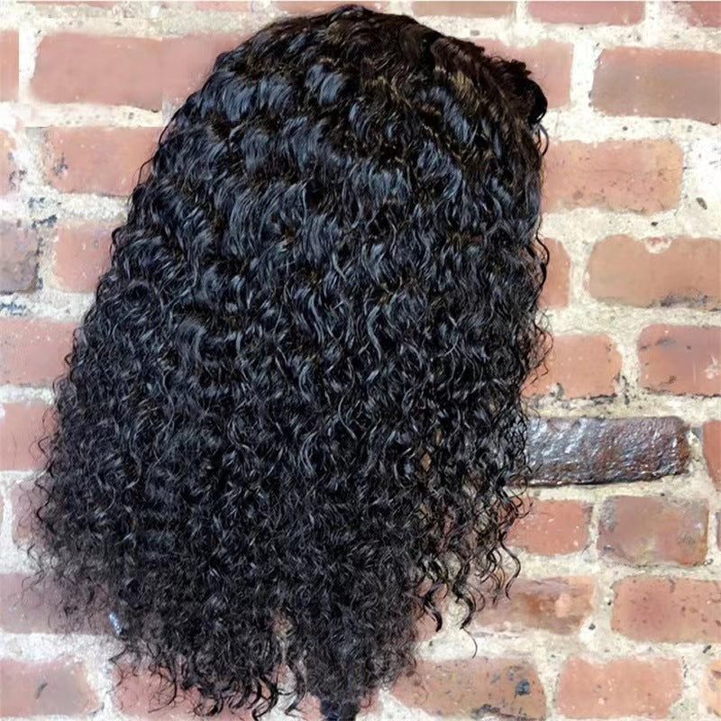 Short curly black synthetic lace front bob wig shown on a model, front view