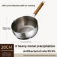 Pure titanium hammered snow pot with a wooden handle seen from above