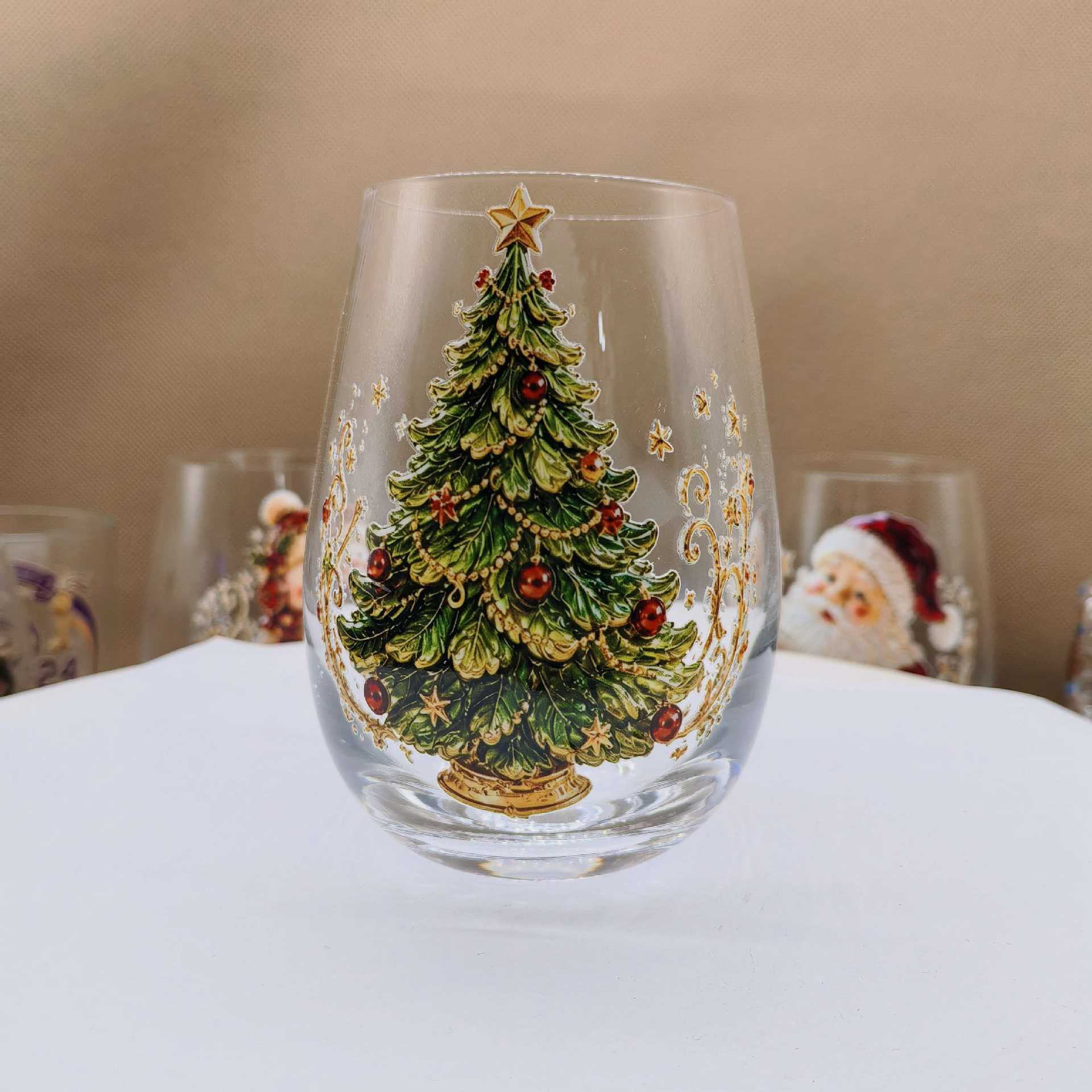 Clear borosilicate Christmas glass cup with a raised painted flat Christmas tree holiday motif