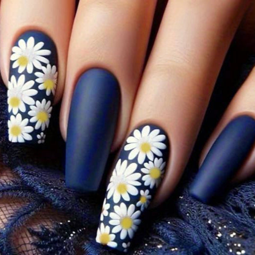 Side angle of nail stickers pressed flat against the nail surface