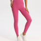 Solid-tone high-waisted yoga leggings for women in a nylon spandex knit, on a model