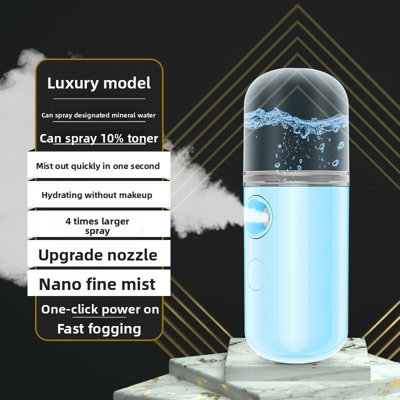 Blue nano facial mister on stone with notes on the refillable tank and nozzle