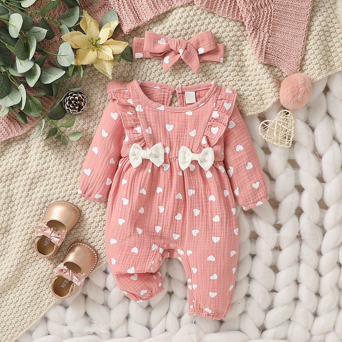 Baby floral romper and band worn in an everyday lifestyle scene
