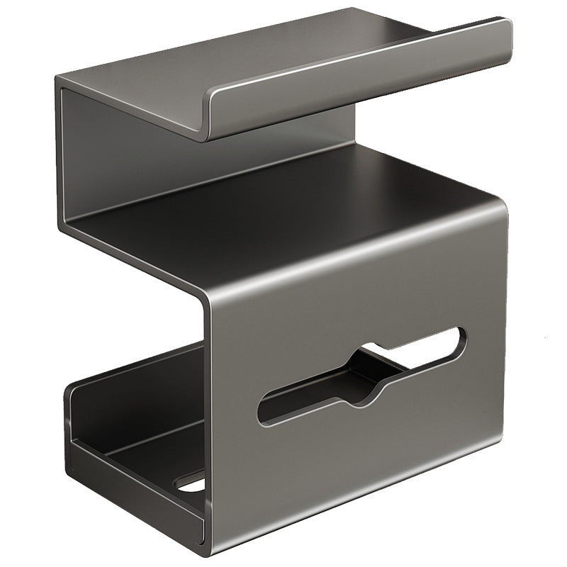 Wall mounted bathroom paper holder shown from the side with a roll of paper hanging