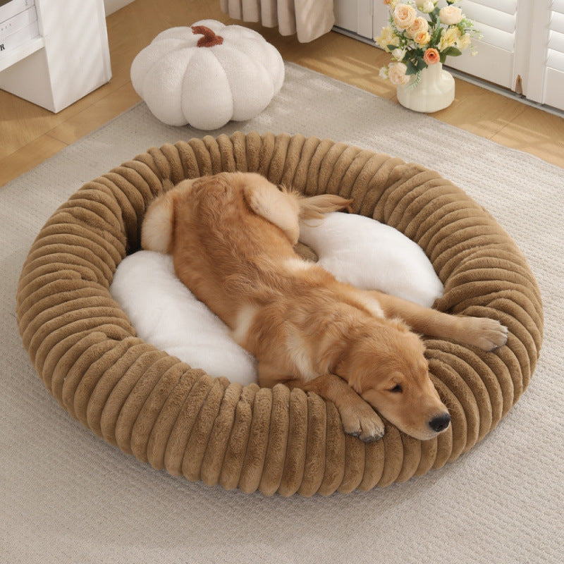 A Round Plush Bed Your Pet Sinks Into and Stays
