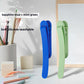 Two piece set of silicone bookmark clips in sapphire blue and mint green on a desk