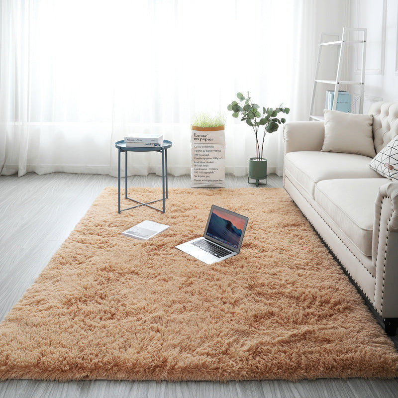 Detail view of the dense long pile and soft surface of the shaggy area rug