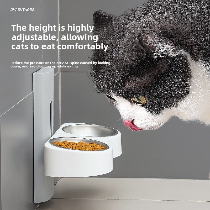 Wall mounted double pet bowl with steel bowls and a cat reaching to eat