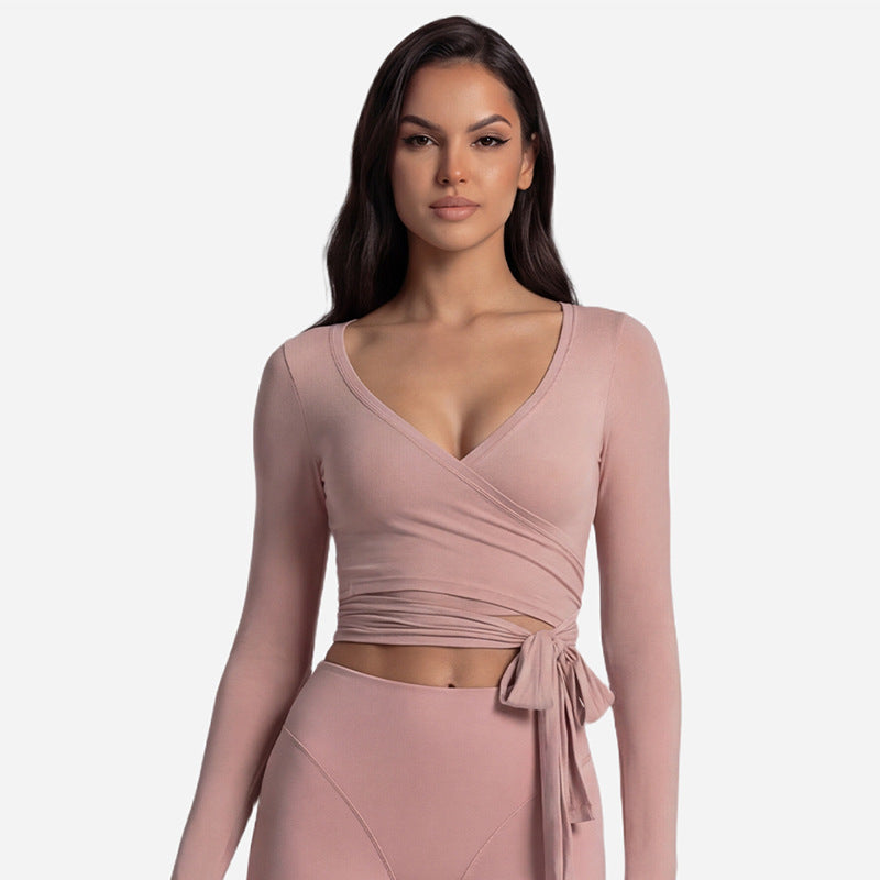 Long sleeve wrap top that crosses at the front and ties at the waist