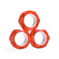 Adult using magnetic fidget rings at an office desk