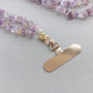 Amethyst citrine phone lanyard worn crossbody at hip length on the body