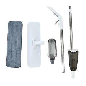 Spray mop kit laid out with grey microfiber pad, white flat head, spray bottle and steel pole