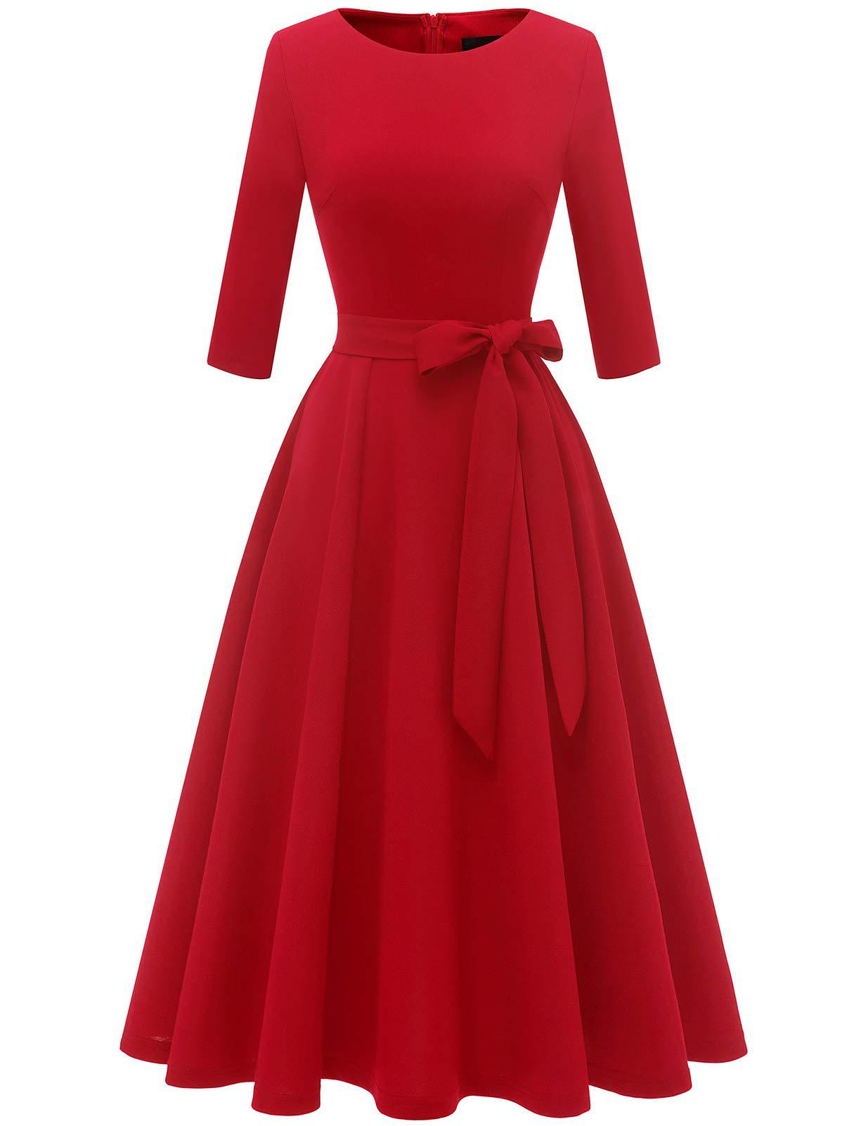 Swing dress with bow belt arranged in a gift ready presentation view