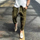 Army green ribbed corduroy pants with drawstring waist and thigh pockets, photo used for the Army Green XXXL option