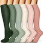 Knee high compression cycling socks with a ribbed cuff and textured sole
