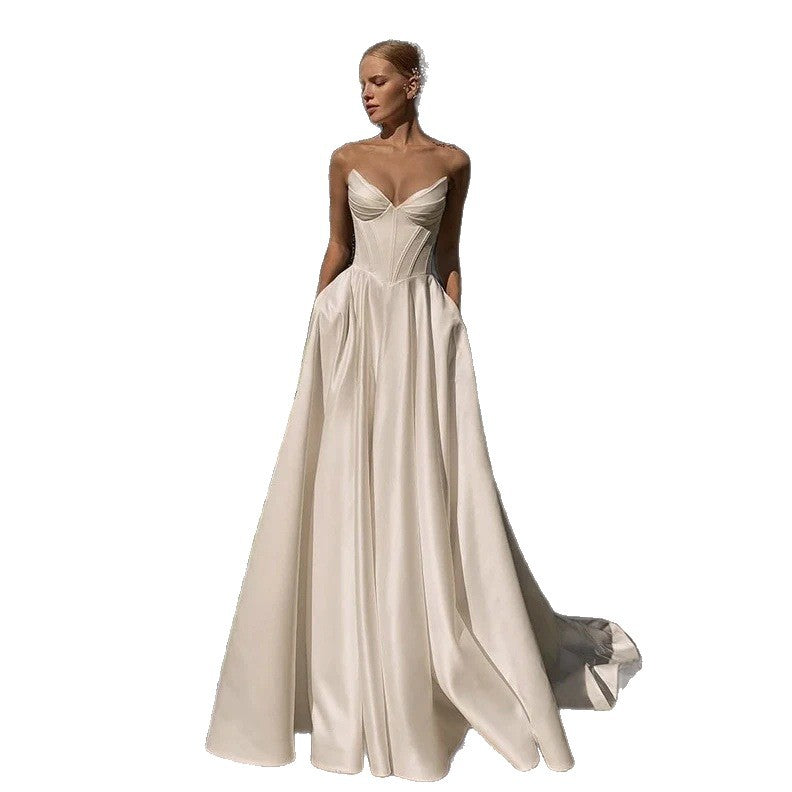 White A line wedding gown with hidden side pockets shown from the front