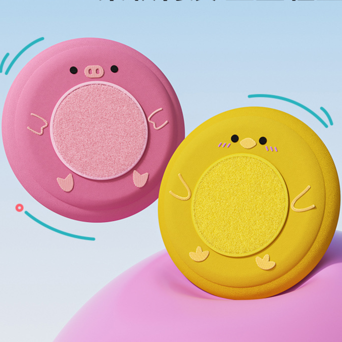 Pink pig and yellow chick soft plush flying disc dog toys side by side