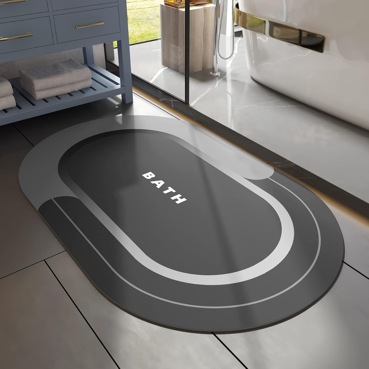 Quick dry bath mat shown beside a tub in a bright bathroom