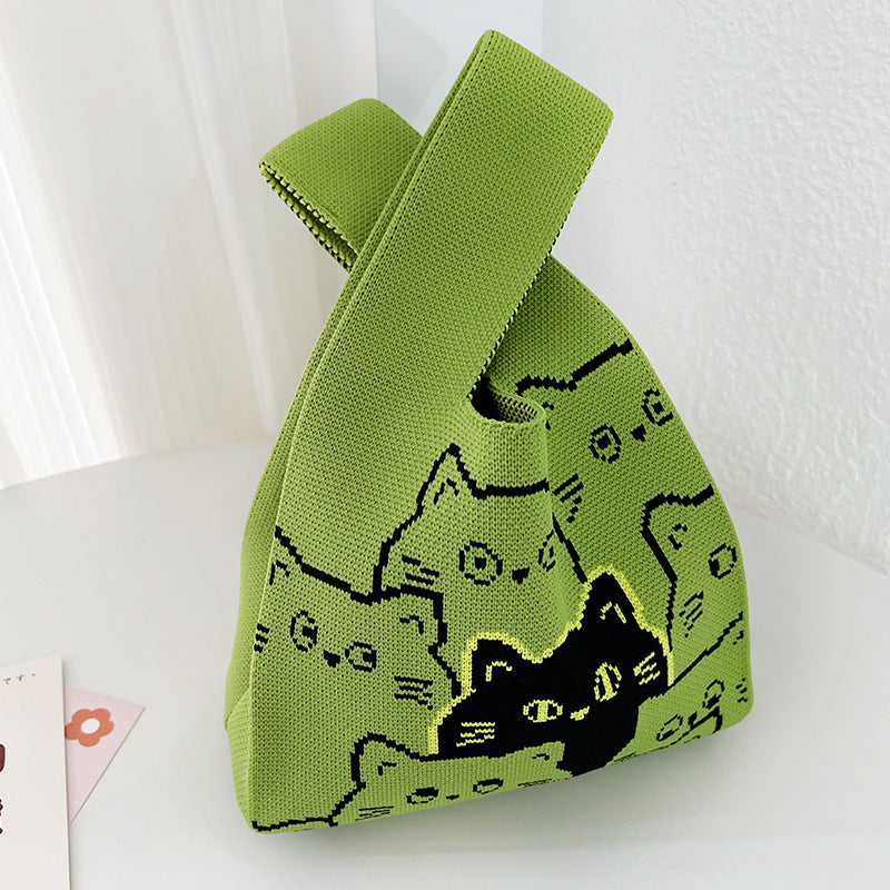 Knitted polyester handbag with an open top and a two tone jacquard motif