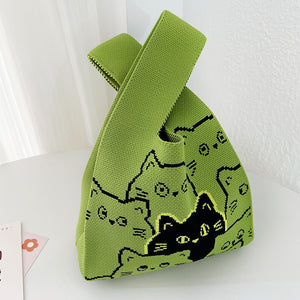 Knitted polyester handbag with an open top and a two tone jacquard motif