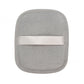 Reusable makeup remover pad with a satin hand strap shown on a plain background