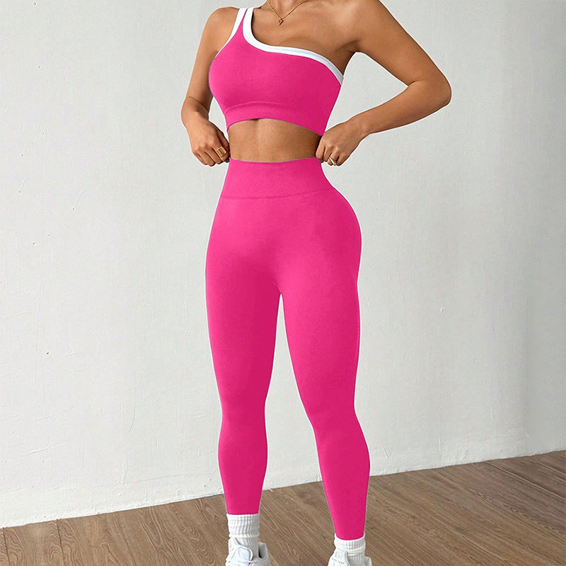 Navy blue one shoulder yoga set with white trim, crop sports bra and high waist leggings