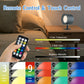 Magnetic wall lamp mounted by a bedside for cord-free reading light