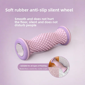 Close up of the pink foot massage roller showing rounded nubs and smooth non slip rubber end caps